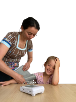 A nurse measuring the blood pressure to a smiling child